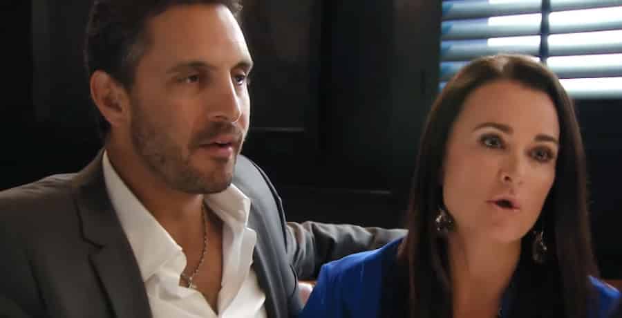 Mauricio Umansky - a man with brown hair with a white shirt unbuttoned, Kyule Richards - a woman with long brown hair 