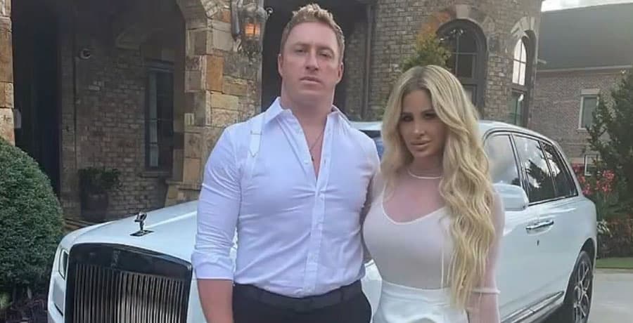Kroy Biermann & Kim Zolciak with car / YouTube