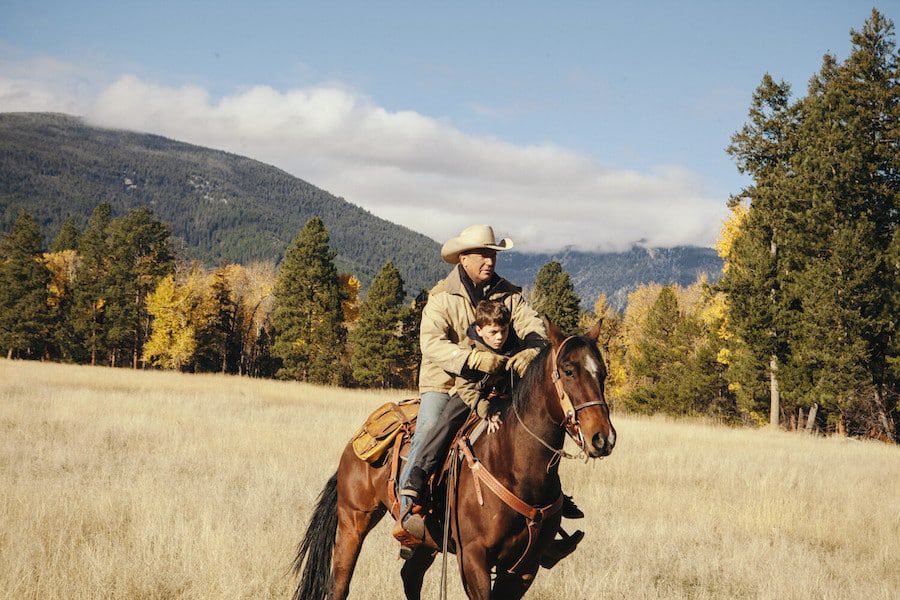Yellowstone Pictured (L-R): Kevin Costner as John Dutton and Brecken Merrill as Tate Dutton. Photo: Emerson Miller for Paramount