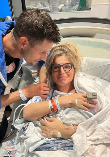 Chad and Erin Bates Paine with sixth child, William Gage Paine.