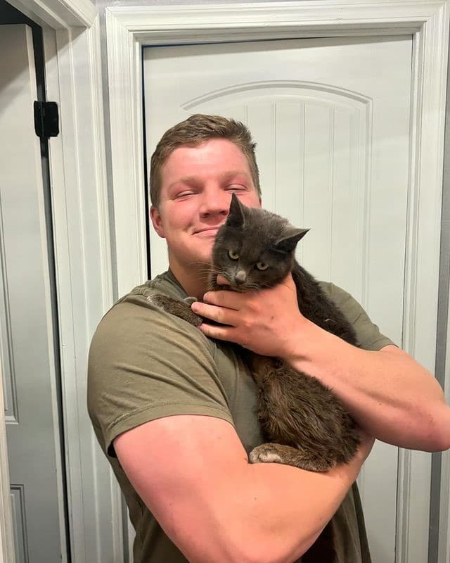 Garrison Brown with Mrs. Buttons, sourced from Instagram