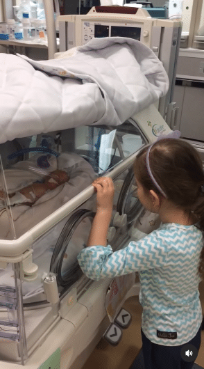 Blayke Busby visiting her sister in the hospital. - Instagram