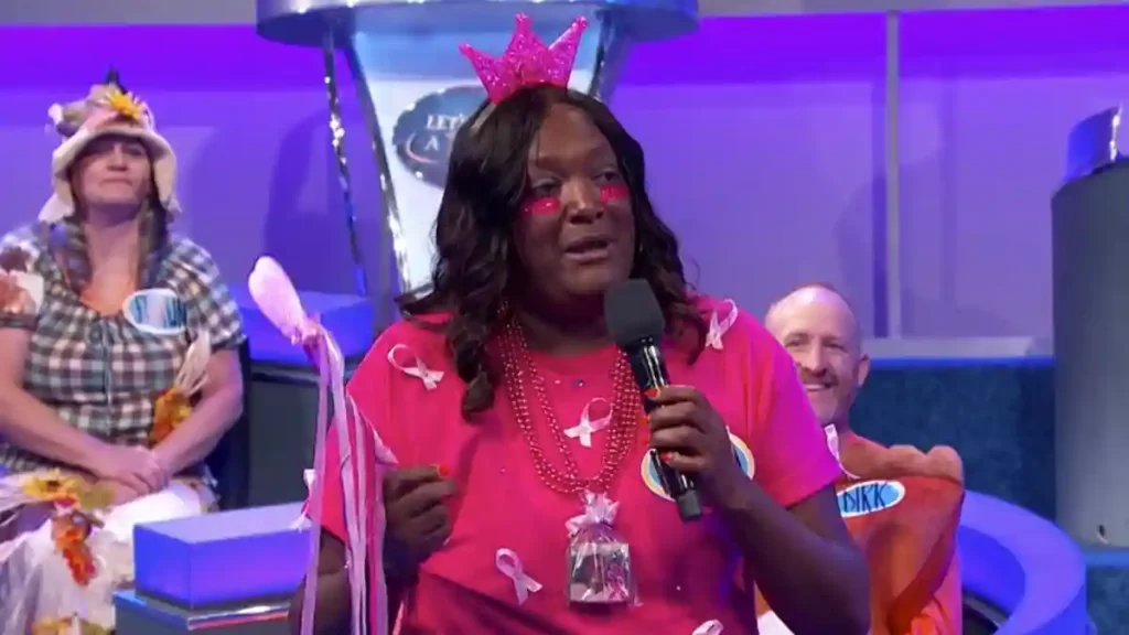 Rhonda tells Wayne Brady her inspirational story. - Let's Make A Deal