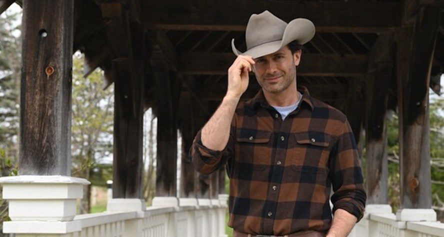 In Great American Media’s “Crossroad Springs,” Jonathan Stoddard is big city pastor, James, who moves back to the community of his youth to help his aging dad and aunt run the family farm. Once there, James discovers what the community needs most is a place to worship, a true cowboy church. “Crossroad Springs” streams August 28 on Pure Flix and premieres on Great American Family, August 31 (8 p.m. ET). Photo: Copyright Great American Media 2025