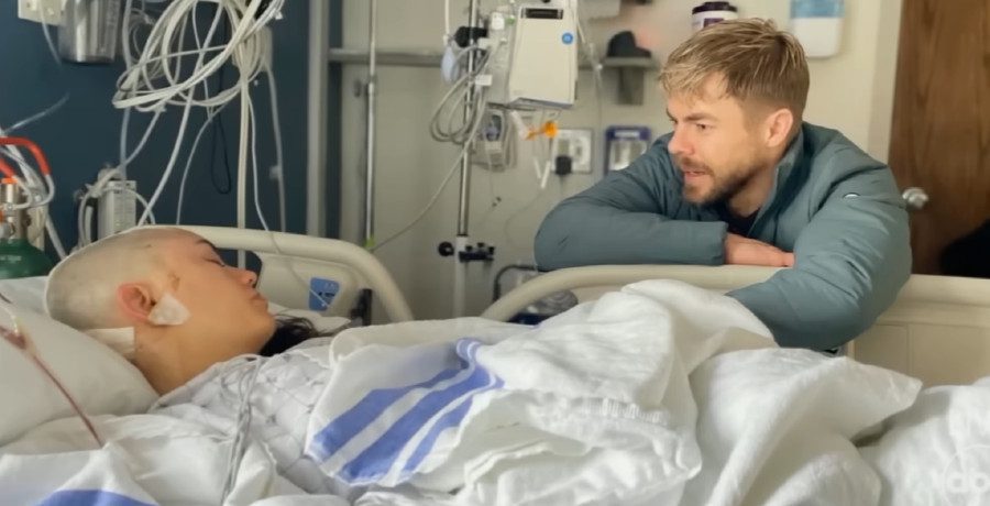 Derek Hough at his wife's hospital bedside/Credit: YouTube